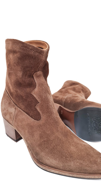 This beautiful Alberto Fasciani boot takes cues from western style and an effortless and cool aesthetic. Wear these pointy beauties with your favourite summer dress for a trendy look.  The boots are made with premium quality suede and natural leather lining.  The silky natural leather insole make them breathable, the zip closure allows an easy fit.   Premium suede calf leather upper and calf leather lining. Sole 95% leather, 5% rubber. 100% Made in Italy.