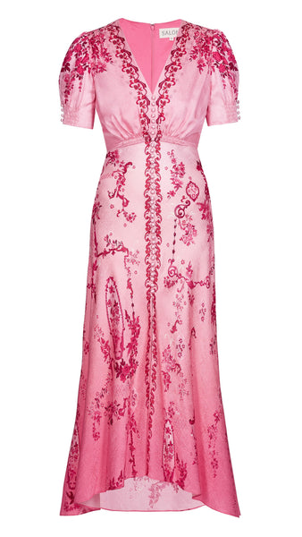 A signature Saloni shape, the Lea dress is a wardrobe favourite. Its beautifully realised bias cut flatters the figure, allowing the fabric to glide around the body for effortless and graceful movement. The exquisite pink floral print placement features tonal pink decorative frames and floral clusters that flow effortlessly over a delicate ombre ground. This dress is a romantic and contemporary wardrobe hero for all your summer occasions.
100% silk.