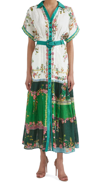 The Saloni Riya B is an elegant shirt dress with a cinched waist and a softly pleated full skirt. Delicate and eye-catching blossoms on a white and green colour-blocked background evoke the charm of Italian gardens and rose-strewn pergolas. Designed and cut to be cool and comfortable in the hottest weather, this linen dress, with its elevated detailing, is perfect for all events.