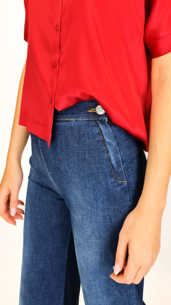 Elevate your summer wardrobe with this Shaft classic.  Super wide high waisted design and light silky denim, these jeans offer both style and comfort. Perfect for warm weather, they are a must-have for any fashion-forward individual. Upgrade your denim game today!