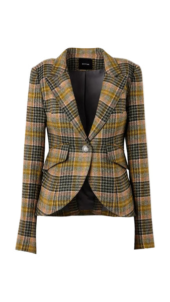 A women's tailored blazer in a brown, beige, and black plaid pattern, featuring structured shoulders, a single front button, and a draped waist detail, shown against a plain light gray background.