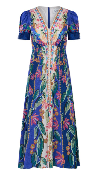 Colorful floral dress with blue accents on a white background