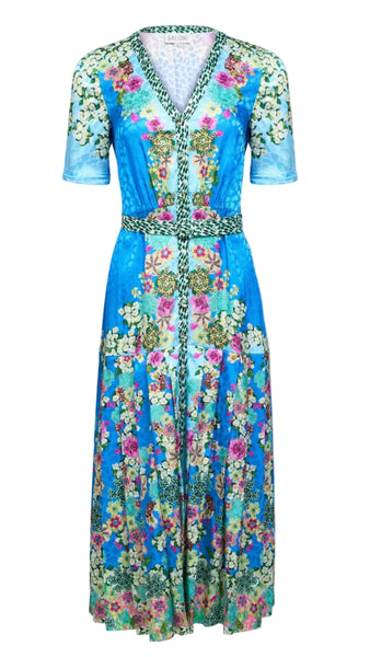 Floral dress with a blue and green pattern on a white background