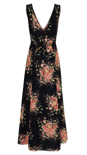 Back of a black floral dress on a white background