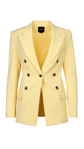 Yellow blazer with black buttons on a white background