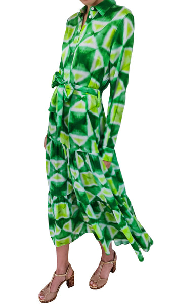 Elevate your style with this Caliban dress. Featuring a stunning green tie dye print and tiered maxi shape, this dress effortlessly combines bohemian and modern. Stand out in any crowd with this unique piece, perfect for both casual and formal occasions.