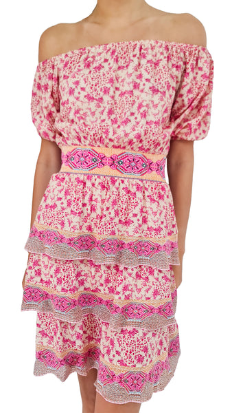 Experience the ultimate summer romance with this Cecilia Prado dress. Sweet and feminine, this tiered mini dress is your go-to for your holiday adventures. Adorned with a beautiful pink floral pattern, it's a dreamy addition to your wardrobe. Get ready to turn heads and make memories in this stunning dress!