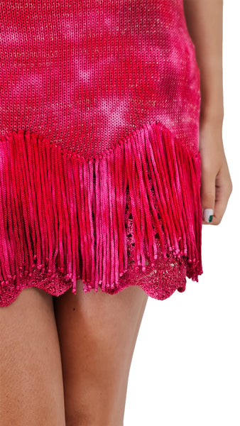 Unleash your inner fashionista with this Cecilia Prado mini dress. This stunning dress features a vibrant hot pink tie dye pattern, making it perfect for standing out at any event. The woven fabric adds a touch of texture and the mini length adds a flirty and playful touch, notice the amazing details in the hem. Show off your bold style with this must-have piece!