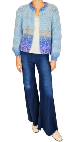 <p data-mce-fragment="1"><span data-mce-fragment="1">Gabi Shade is a hand knitted open cardigan with soft hues of blue. The cardigan has beautiful colour shading, which can only be achieved so nicely when knitted by hand.</span></p> <p data-mce-fragment="1"><span data-mce-fragment="1">The cardigan is knitted by hand by Italian women working from their homes in the hilly villages in Tuscany. Therefore each piece is unique and sizes will vary slightly from piece to piece.</span></p>