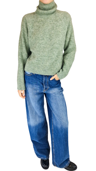 A person wearing a light sage green turtleneck sweater and wide-leg blue jeans
* Masscob brushed alpaca blend jumper light green
* Masscob light green alpaca sweater
* Women's light green turtleneck jumper
* Masscob brushed alpaca knit sage green
* Light green alpaca blend turtleneck sweater
* Women's fluffy green roll neck jumper
* Designer brushed alpaca sweater women
* Masscob raglan sleeve green jumper