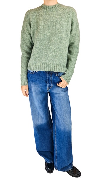 A person wearing a light sage green knit sweater and wide-leg blue jeans

light green alpaca wool sweater • women's sage green knit jumper • raglan sleeve alpaca sweater • heathered green pullover • cozy alpaca wool knitwear