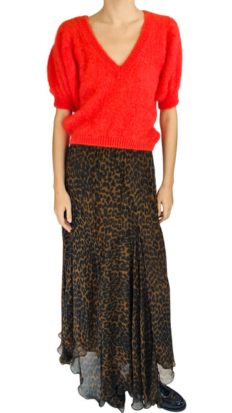 Mes Demoiselles Blip Coral Mohair Jumper | Luxury V-Neck Knit   
Elevate your knitwear collection with the Mes Demoiselles Blip Coral Mohair Jumper. Featuring puff sleeves and a deep V-neck in a vibrant coral hue.   
 Mes Demoiselles Blip jumper, coral mohair sweater, short sleeve mohair jumper, luxury coral V-neck knit, designer women's mohair top