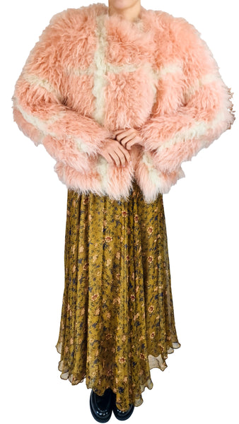 Mes Demoiselles Mushu Pink Shearling Jacket | Luxury Faux Fur Coat   
 Make a glamorous statement with the Mes Demoiselles Mushu Pink Shearling Jacket. Plush, textured finish with cream paneling for high-end winter style.   
Mes Demoiselles Mushu jacket, pink shearling jacket, luxury faux fur coat, designer pink fluffy jacket, statement outerwear women