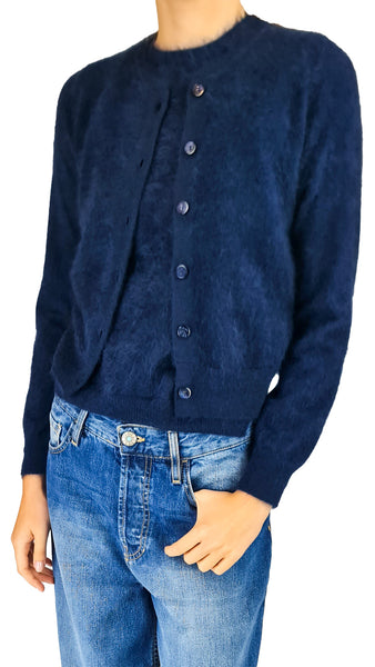 A person wearing a dark navy blue knit button-front cardigan with a round neckline and blue jeans
Purotatto brushed cashmere cardigan, navy button cardigan, women's navy cashmere cardigan   
Purotatto long sleeve navy cardigan, luxury brushed cashmere sweater, soft navy button front cardigan   
Italian cashmere cardigan women, designer navy knitwear, classic navy brushed cardigan