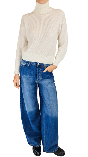 A model wearing a cream ribbed turtleneck sweater and wide-leg blue denim jeans, paired with black shoes
* Purotatto latte sparkle ribbed turtleneck jumper
* Purotatto sparkle ribbed turtleneck
* Latte cream sparkle knit sweater
* Women's cream ribbed turtleneck with sparkle
* Purotatto metallic thread ribbed jumper
* Designer latte cream turtleneck jumper
* Shimmer cream turtleneck sweater women
* Italian sparkle ribbed turtleneck knitwear