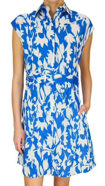Blue and white floral patterned dress on a neutral background