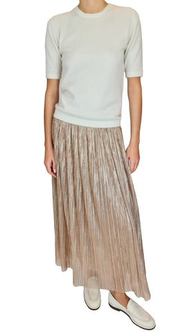 This sheer metallic powder pink pleated skirt will add a touch of elegance and glamour to any outfit. Perfect for special occasions or a night out, this Purotatto skirt will make you stand out and shine. Or dress down but bring sparkle to your outfit, and wear with a t-shirt and loafers.