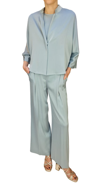Light blue pantsuit worn by a person on a white background