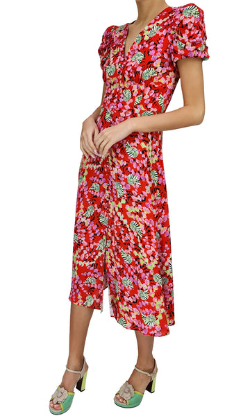 Every wardrobe needs a go-to flowery dress, and this Saloni dress is the ultimate choice for all manner of sartorial occasions. A vivid print of cascading shells and sun-kissed fiery rouge ripples. Classic in feel but contemporary in silhouette, this midi-length dress features an elegant V-neckline at the front and back, with puffed sleeves that add a sculptural feel, and soft gathers around the bust. 