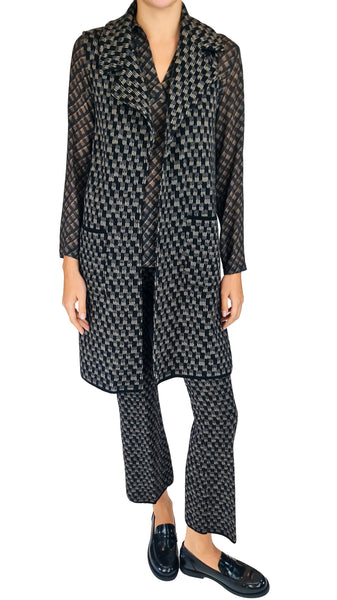 Siyu Serse long gilet, luxury merino wool gilet, designer sleeveless knit coat, longline patterned cardigan, Spanish luxury knitwear
extrafine merino wool sleeveless outerwear, open front knit gilet, geometric jacquard long cardigan, luxury layered outfit ideas, high-end designer knit vest