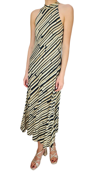 Person wearing a zebra print dress on a white background