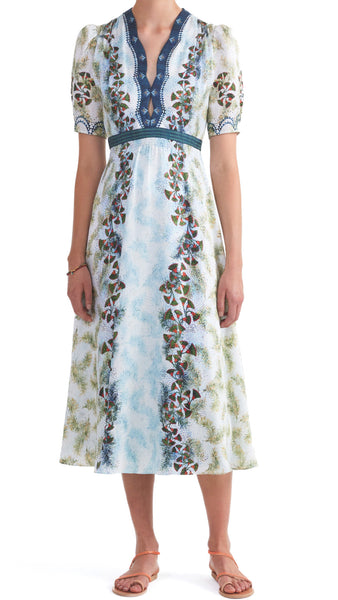 This midi-length Saloni dress features a keyhole neckline, smocking bodice details, and short puff sleeves with smocked cuffs. The fitted waist flatters your figure while the feather papyrus print adds a touch of uniqueness. Elevate your style with this exquisite dress!  100% silk. Dry clean.