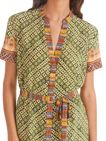 A stylish addition to your wardrobe, this dress has a fit-and-flare skirt that flounces as you walk. Fern green and burgundy mosaic tiles are adorned with floral jewelled borders. Crafted from printed silk and featuring a tie waist it is a perfect choice for any occasion.  100% silk. Dry clean.