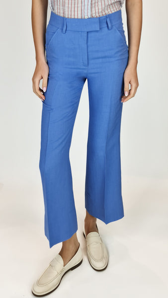 Made with sweet light blue linen mix, these trousers offer a comfortable and stylish fit. Perfect for any occasion, they will be a versatile addition to your collection. Embrace effortless style and feel confident in these must-have trousers.