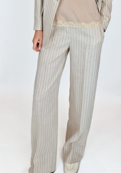 <p>This natural coloured style features fabulous pinstripes that exude confidence and style. Elevate your wardrobe with this versatile and elegant pair, perfect for any summer occasion.&nbsp;</p> <p>Wear together with the Purotatto Linen Stripe jacket for the ultimate suited summer look.</p>