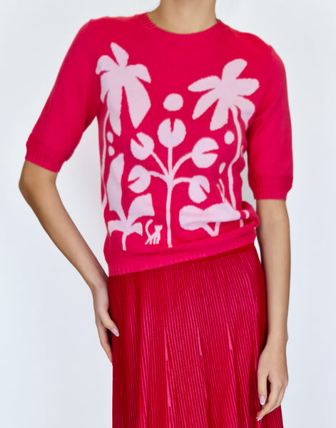 Get ready to add some fun to your mid-season wardrobe with this Happy Sheep combo! With its warm tones of coral and intricate knitted design, this top will add a touch of whimsy to any outfit. Wear with the matching Happy Sheep Pink Rib skirt.