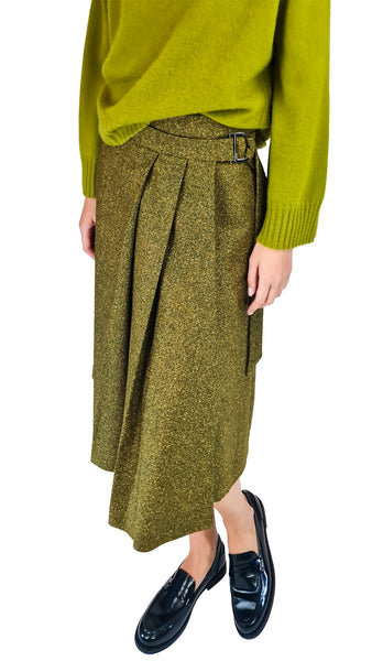 Olive Gold Pleated Kilt Skirt | Designer Slit Midi Skirt   
 Make a statement in our metallic olive gold pleated kilt skirt. High-waisted with sharp pleats and a sultry side slit for effortless luxury styling. Discover more.   
 metallic pleated skirt, gold kilt midi skirt, luxury wrap skirt with slit, designer pleated midi skirt, olive gold skirt