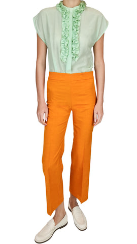 Add a pop of color to your summer wardrobe with this True Royal style. Made with a linen-like material, these bright orange trousers are perfect for the warm weather. Elevate your style and stay cool at the same time!