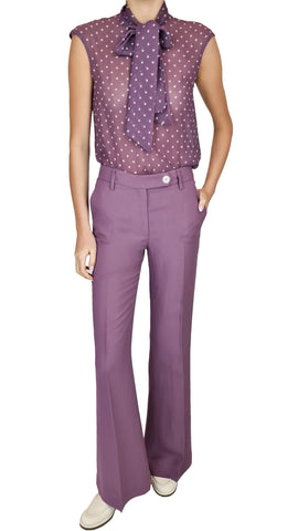 Elevate your wardrobe with this True Royal pair. In a bold violet tone, the classic Bianca shape is sure to turn heads. These trousers promise long legs and a flattering fit, making them a must-have for any fashion-forward individual. Add a pop of colour to your wardrobe and feel confident in these stylish trousers.